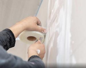 How to Use Adhesive Tape During Drywall Installation